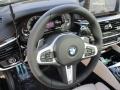 BMW 5 Series M550i xDrive Sedan Carbon Black Metallic photo #13