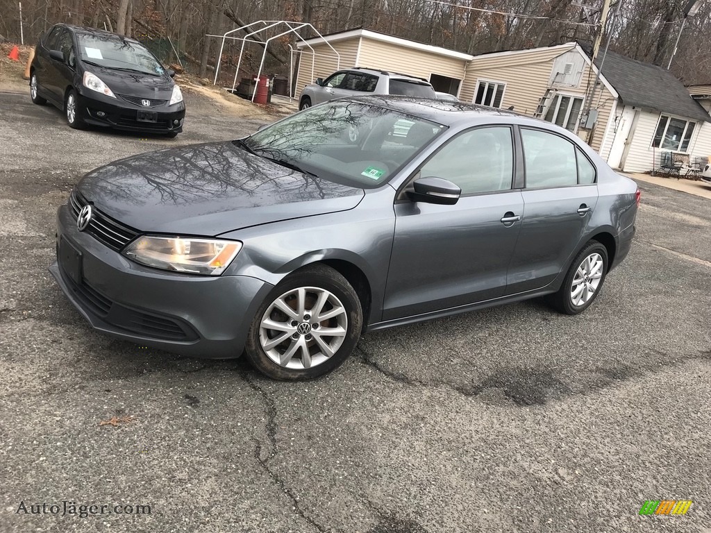 2011 Jetta SE Sedan - Tempest Blue Metallic / Cornsilk Beige photo #1