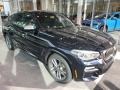 BMW X4 M40i Carbon Black Metallic photo #1