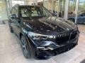 BMW X5 M50i Carbon Black Metallic photo #1