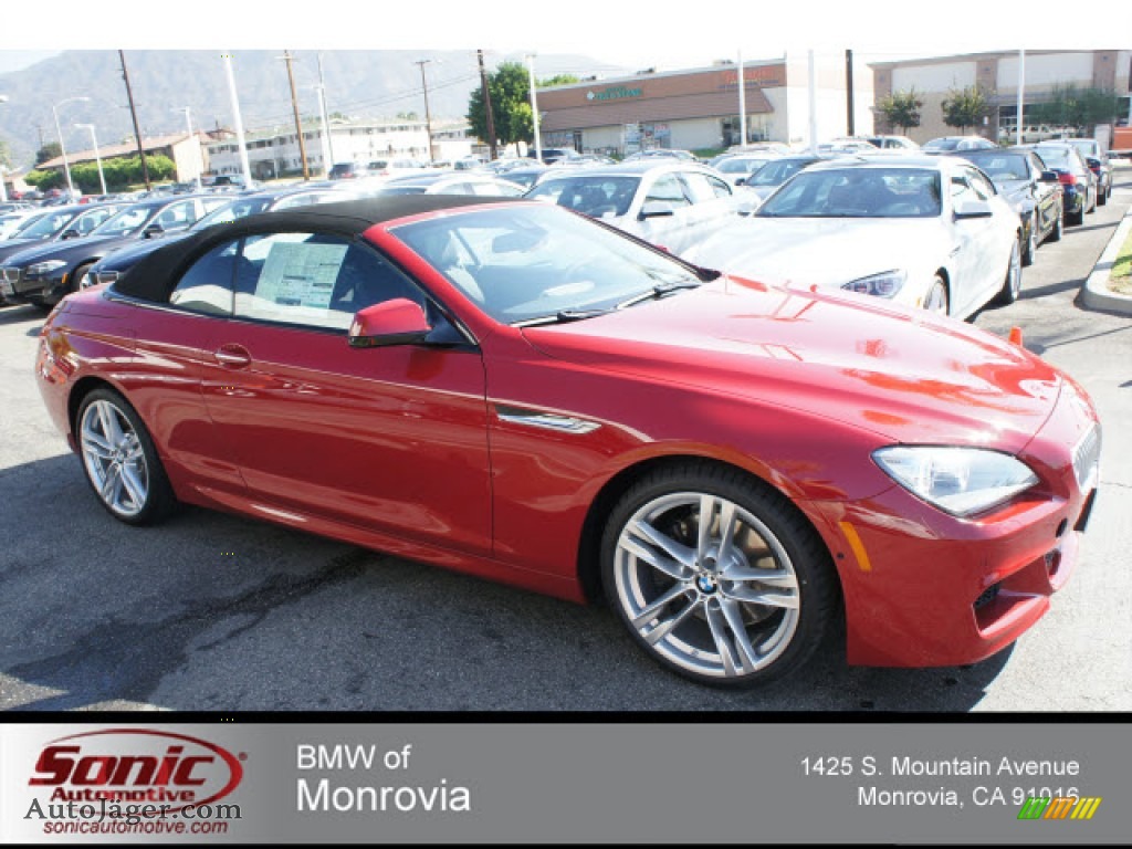 Imola red bmw convertible